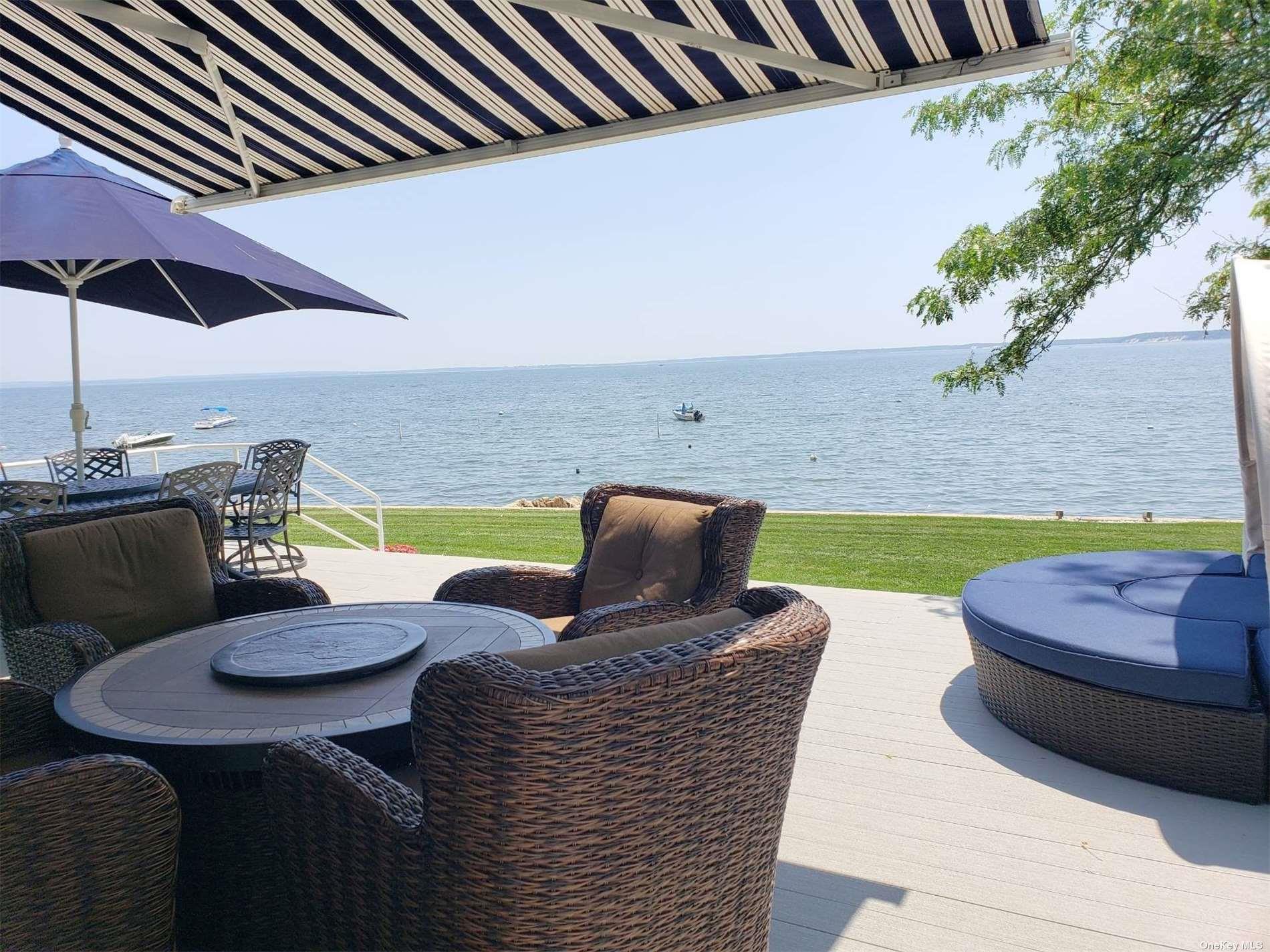 11 Beach Road Riverhead, NY 11947 - Photo 7 of 34 a view of outdoor space with seating area