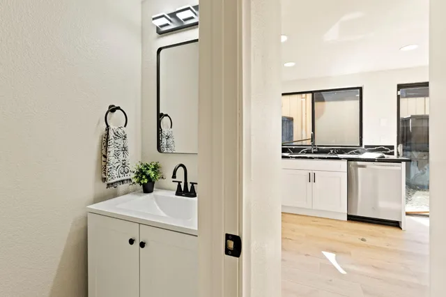 a bathroom with a sink and a mirror