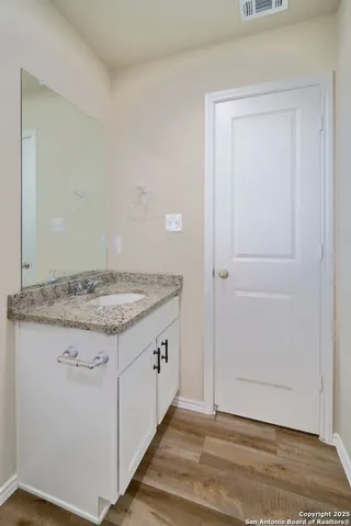 a view of a kitchen cabinets
