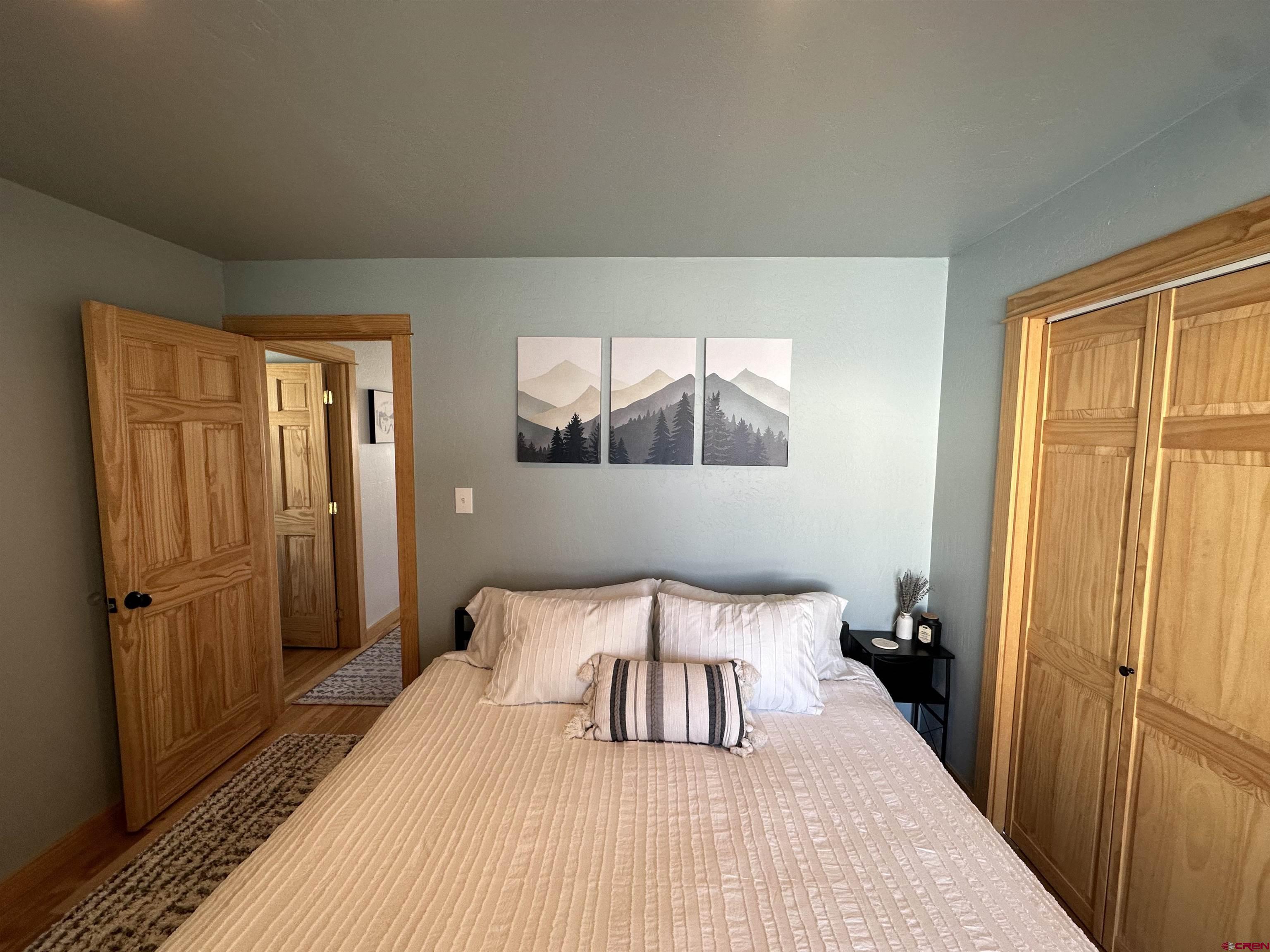 755 Gothic Road, Unit 2 Crested Butte, CO 81225 - Photo 15 of 36 a bedroom with a bed and a window