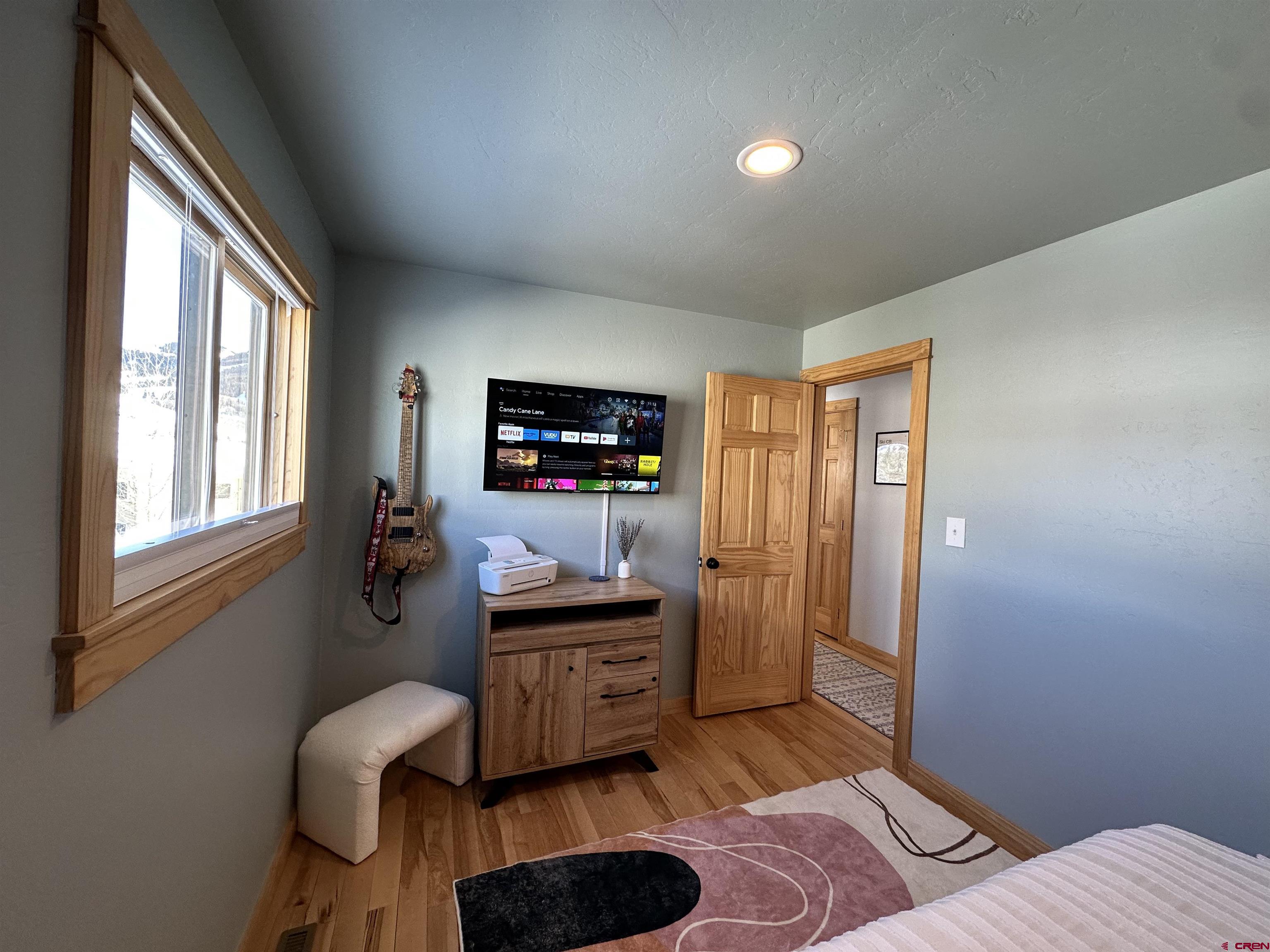 755 Gothic Road, Unit 2 Crested Butte, CO 81225 - Photo 18 of 36 a view of a workspace with furniture and a window