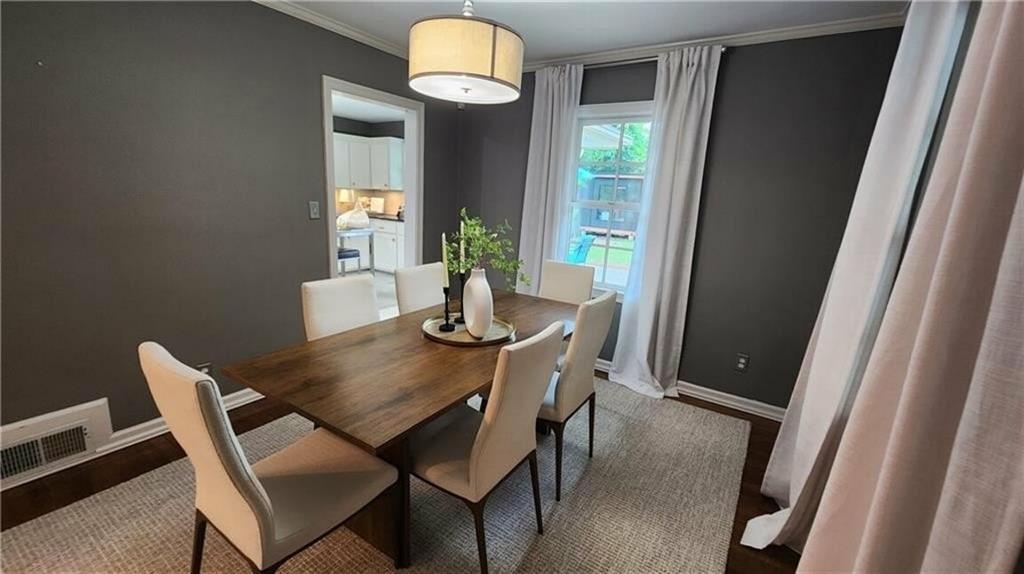 2132 Clairmont Road Decatur, GA 30033 - Photo 5 of 11 a view of a dining room with a table and chairs