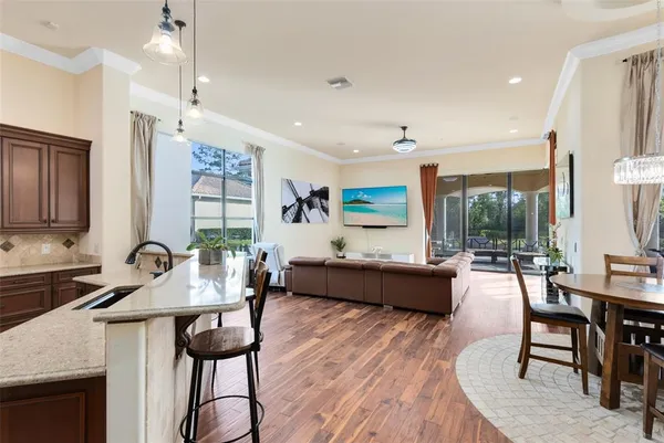 a room with a book shelf and a bath tub