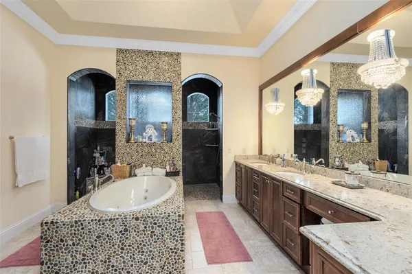 a bathroom with a toilet sink and shower