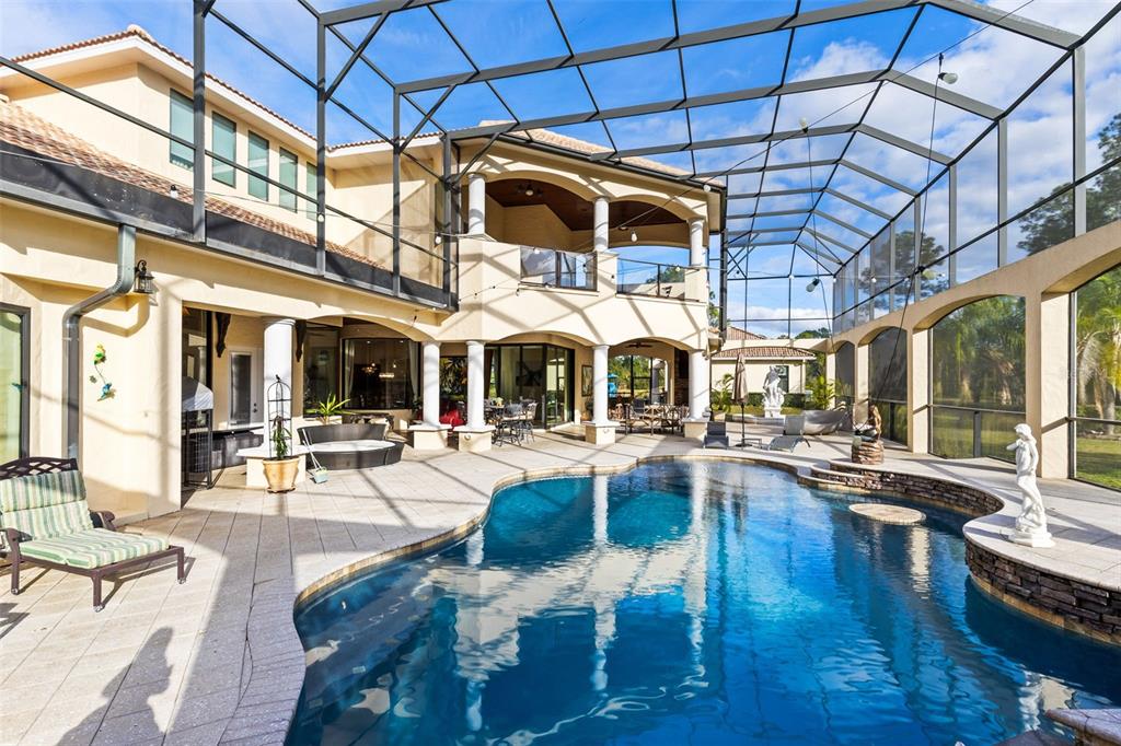 5300 Carson Street St. Cloud, FL 34771 - Photo 41 of 59 a view of a patio with swimming pool table and chairs