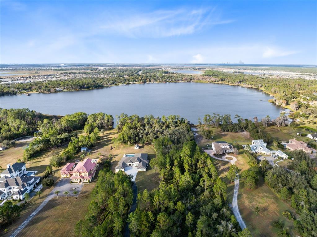 5300 Carson Street St. Cloud, FL 34771 - Photo 57 of 59 an aerial view of residential building and lake