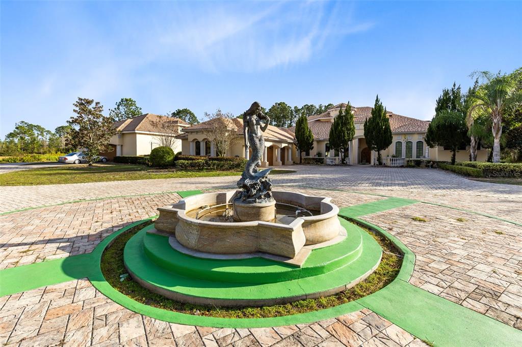 5300 Carson Street St. Cloud, FL 34771 - Photo 6 of 59 a view of a swimming pool with a yard
