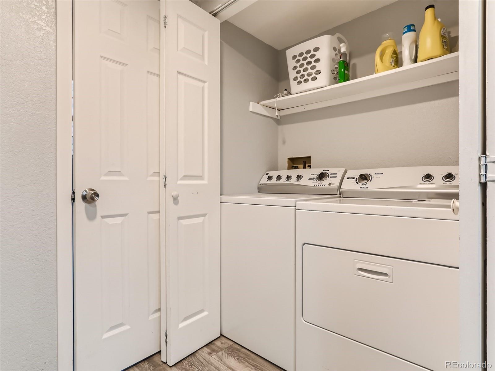5941 South Perth Street Centennial, CO 80015 - Photo 24 of 28 a utility room with dryer and washer