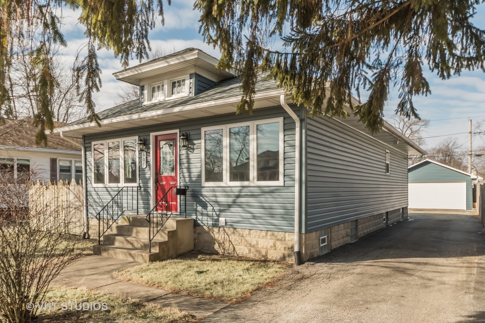 609 North Reed Street Joliet, IL 60435 - Photo 2 of 19 a view of a house with a yard