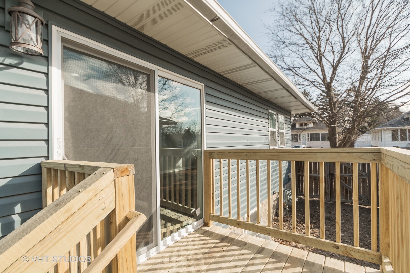 609 North Reed Street Joliet, IL 60435 - Photo 18 of 19 a view of a balcony with wooden floor