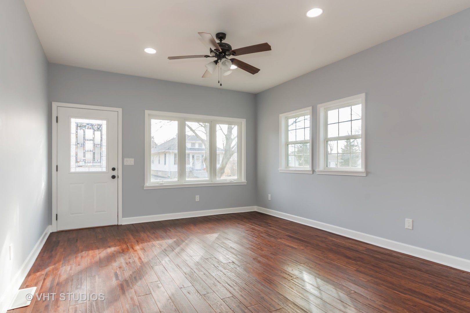 609 North Reed Street Joliet, IL 60435 - Photo 3 of 19 a view of a livingroom with a ceiling fan and window
