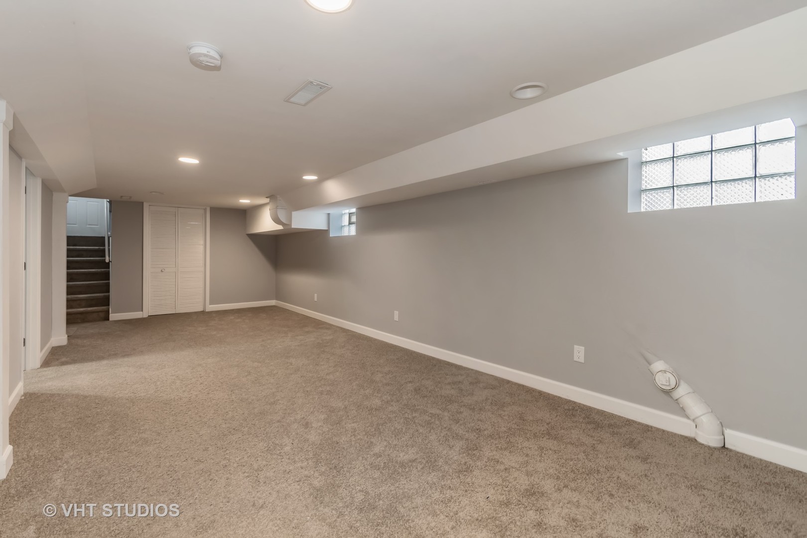 609 North Reed Street Joliet, IL 60435 - Photo 9 of 19 an empty room with a empty space and windows