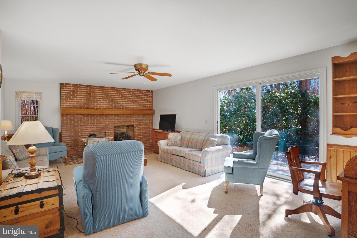 39 John Street Little Egg Harbor, NJ 08087 - Photo 13 of 40 a living room with furniture and a fireplace