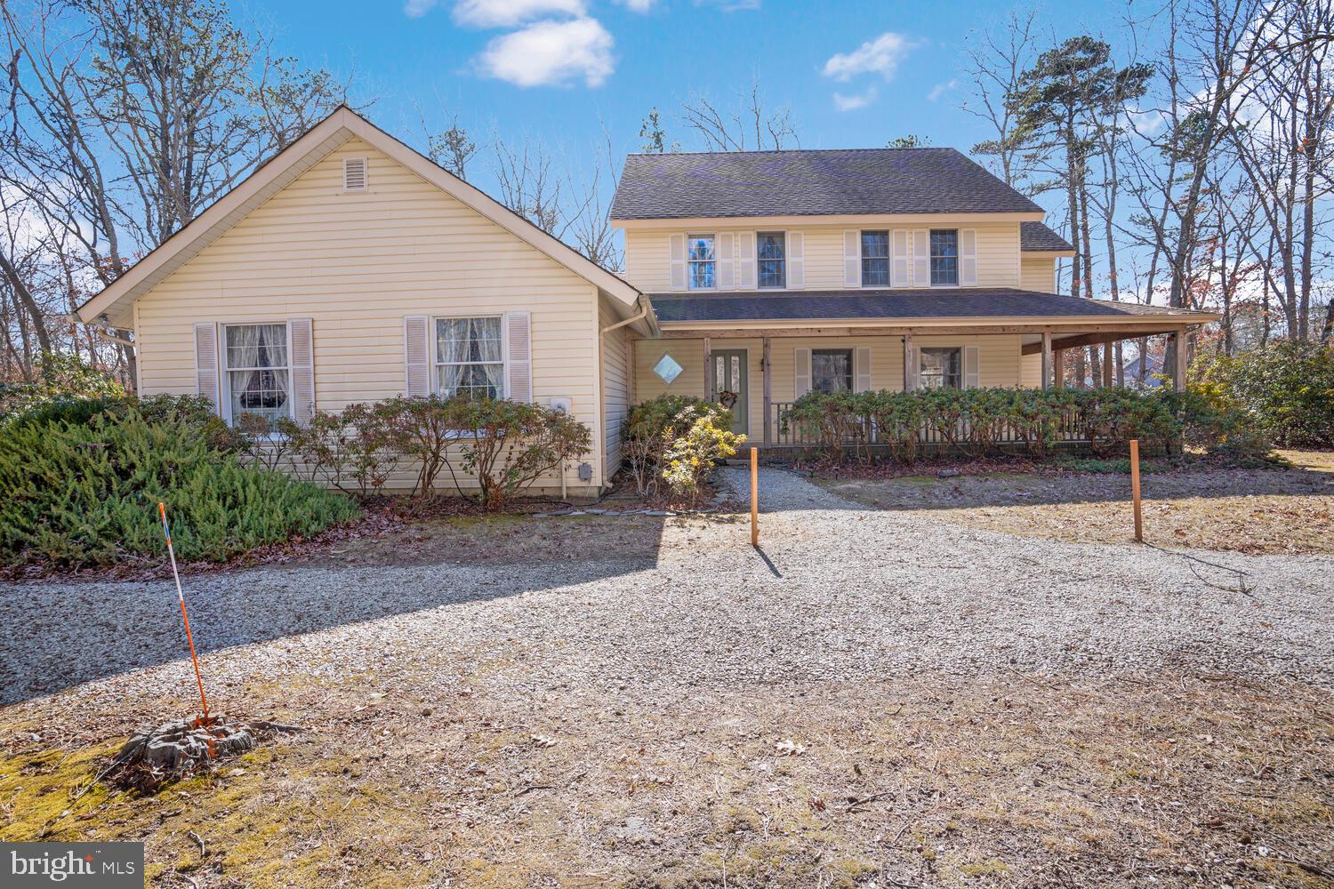 39 John Street Little Egg Harbor, NJ 08087 - Photo 2 of 40 a front view of a house with a yard and garage