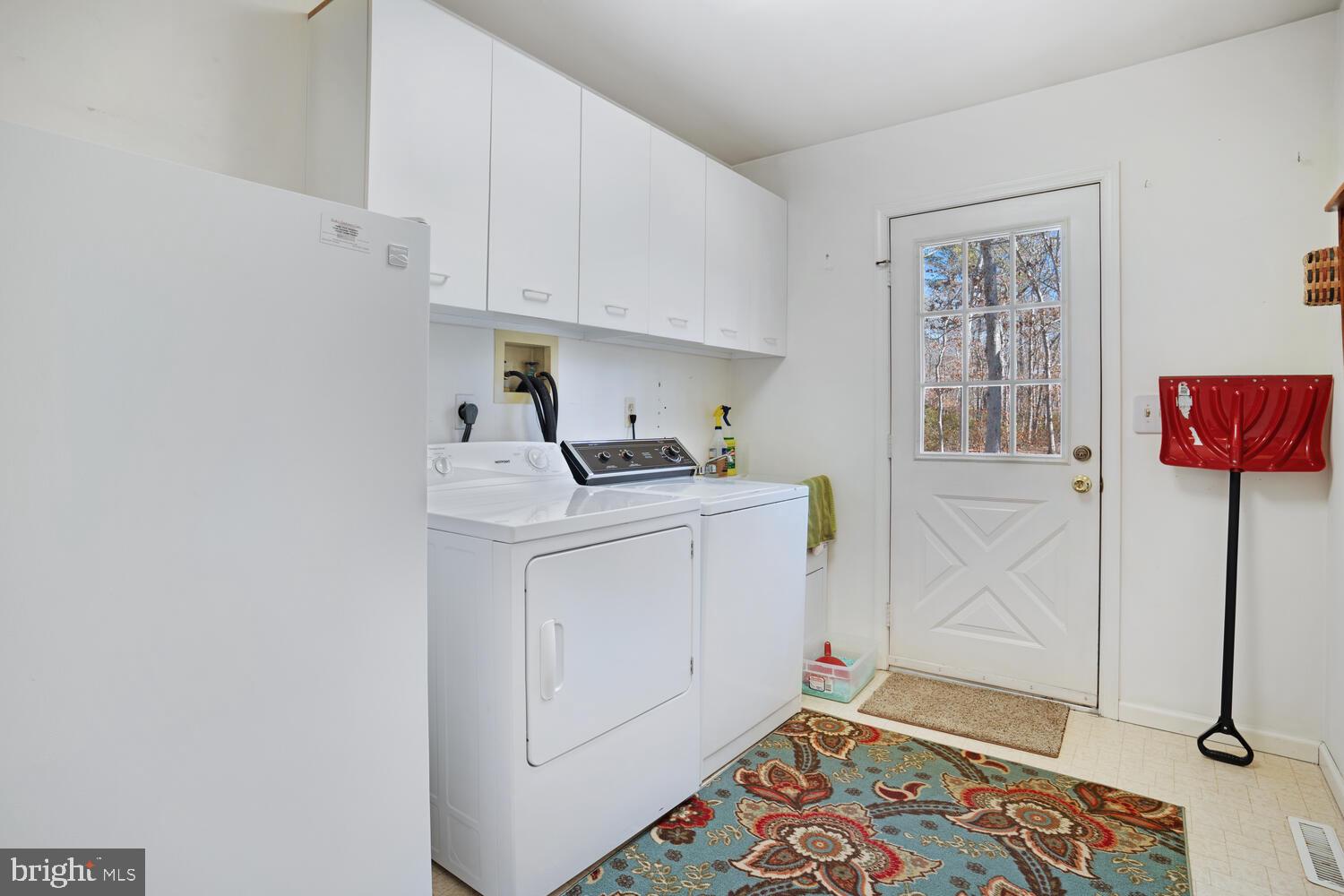 39 John Street Little Egg Harbor, NJ 08087 - Photo 25 of 40 a room with storage and utility