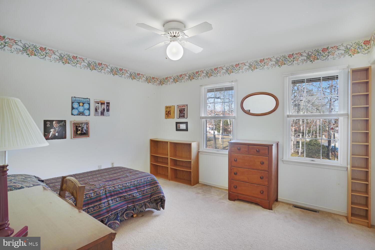 39 John Street Little Egg Harbor, NJ 08087 - Photo 30 of 40 a bedroom with a bed and a chandelier