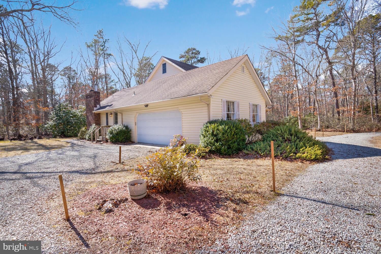 39 John Street Little Egg Harbor, NJ 08087 - Photo 4 of 40 a view of a house with a yard and large tree