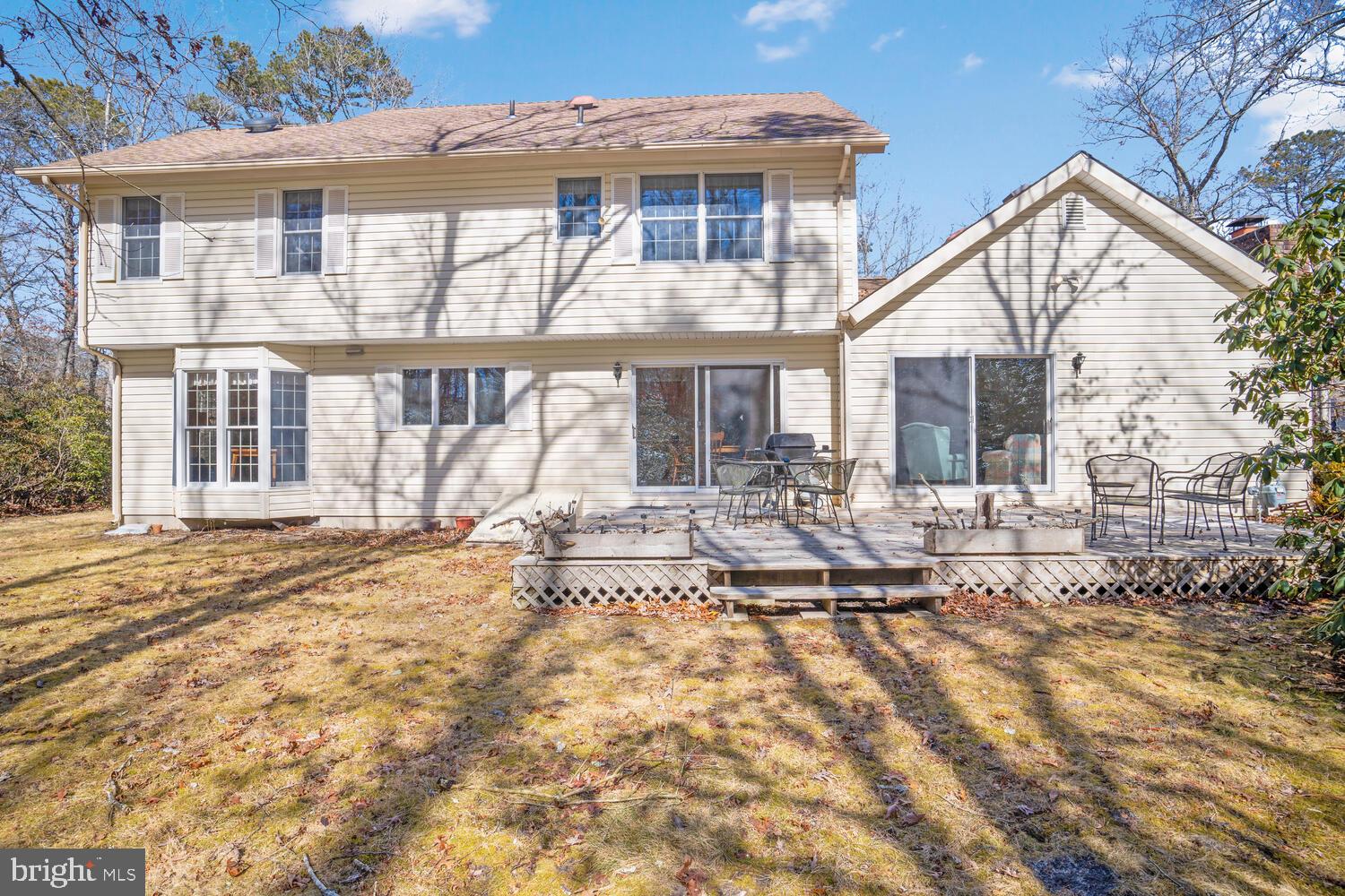 39 John Street Little Egg Harbor, NJ 08087 - Photo 5 of 40 a view of house with yard outdoor seating and barbeque oven