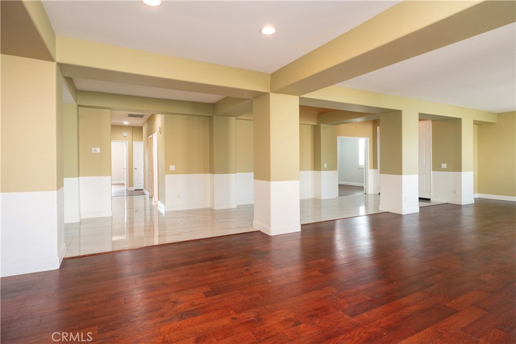 19128 Trail Ride Court Perris, CA 92570 - Photo 13 of 50 a view of an entryway with wooden floor