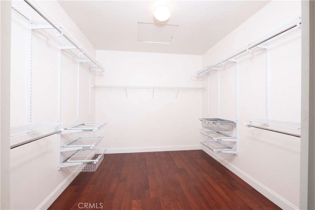 19128 Trail Ride Court Perris, CA 92570 - Photo 25 of 50 a view of empty room with wooden floor