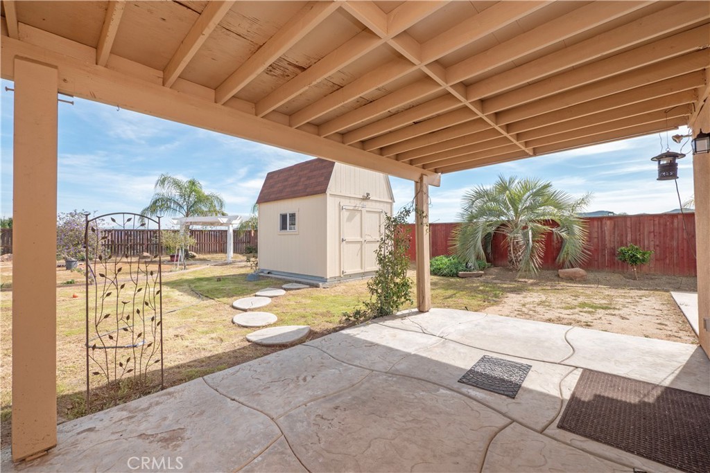 19128 Trail Ride Court Perris, CA 92570 - Photo 33 of 50 a view of a backyard