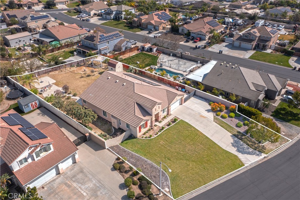 19128 Trail Ride Court Perris, CA 92570 - Photo 49 of 50 an aerial view of a residential houses with outdoor space