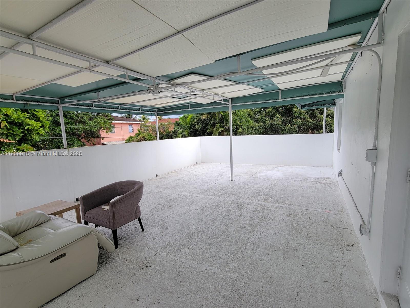 3433 Southwest 12th Street, Unit UPSTAIRS Miami, FL 33135 - Photo 20 of 23 Huge covered 2nd floor patio view out to east