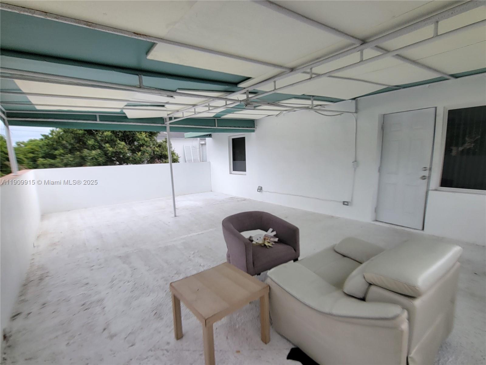 3433 Southwest 12th Street, Unit UPSTAIRS Miami, FL 33135 - Photo 22 of 23 Huge covered 2nd floor patio view east