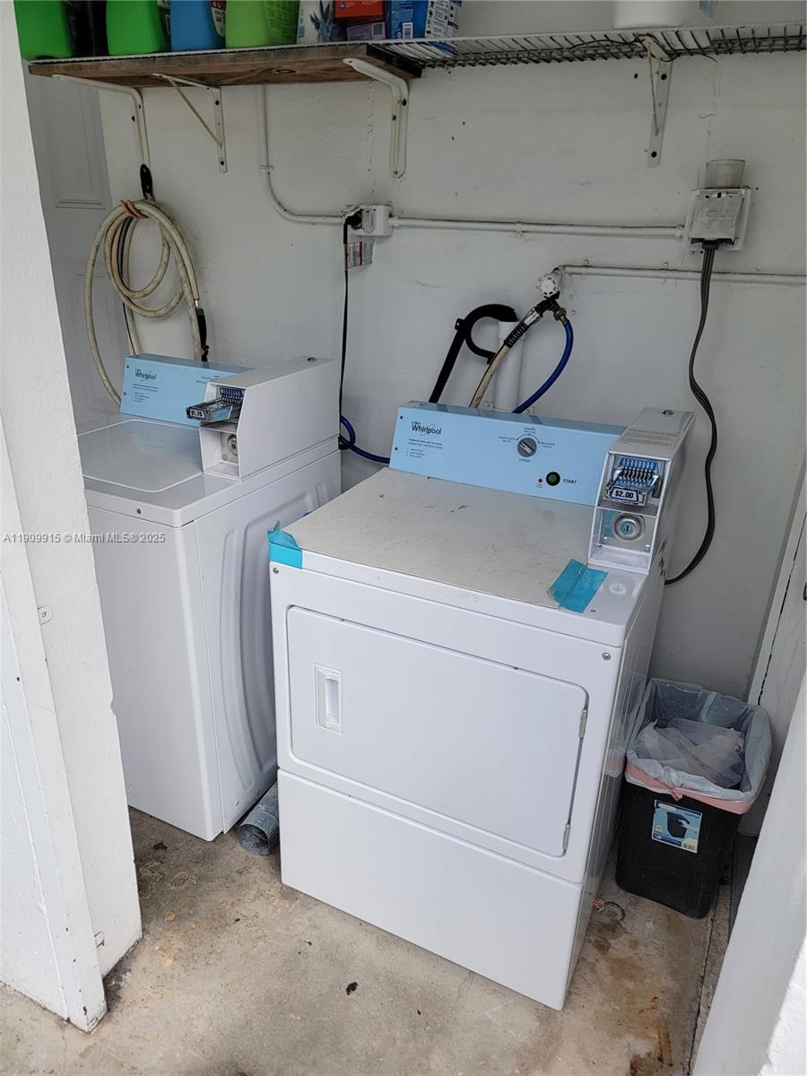 3433 Southwest 12th Street, Unit UPSTAIRS Miami, FL 33135 - Photo 3 of 23 Shared laundry 1st floor below stairs