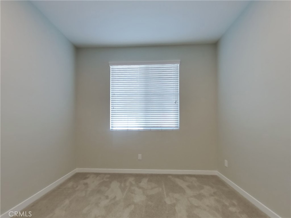36567 Pepino Court Wildomar, CA 92595 - Photo 11 of 31 an empty room with a window