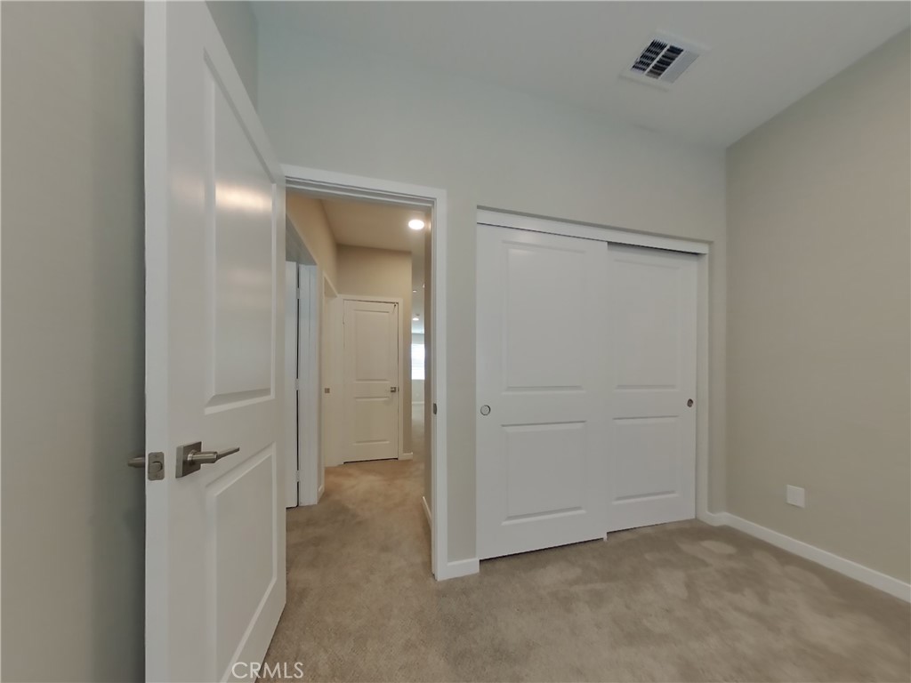 36567 Pepino Court Wildomar, CA 92595 - Photo 12 of 31 an empty room with a bathroom