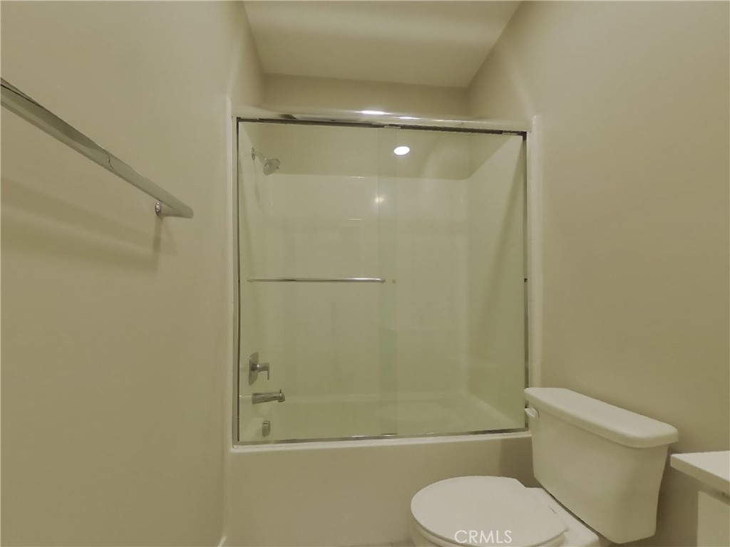 36567 Pepino Court Wildomar, CA 92595 - Photo 15 of 31 a bathroom with a toilet and shower