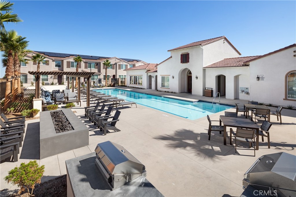 36567 Pepino Court Wildomar, CA 92595 - Photo 28 of 31 a front view of a house with yard and seating area