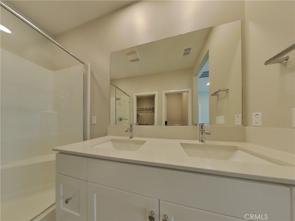 36567 Pepino Court Wildomar, CA 92595 - Photo 8 of 31 a bathroom with a sink and a mirror