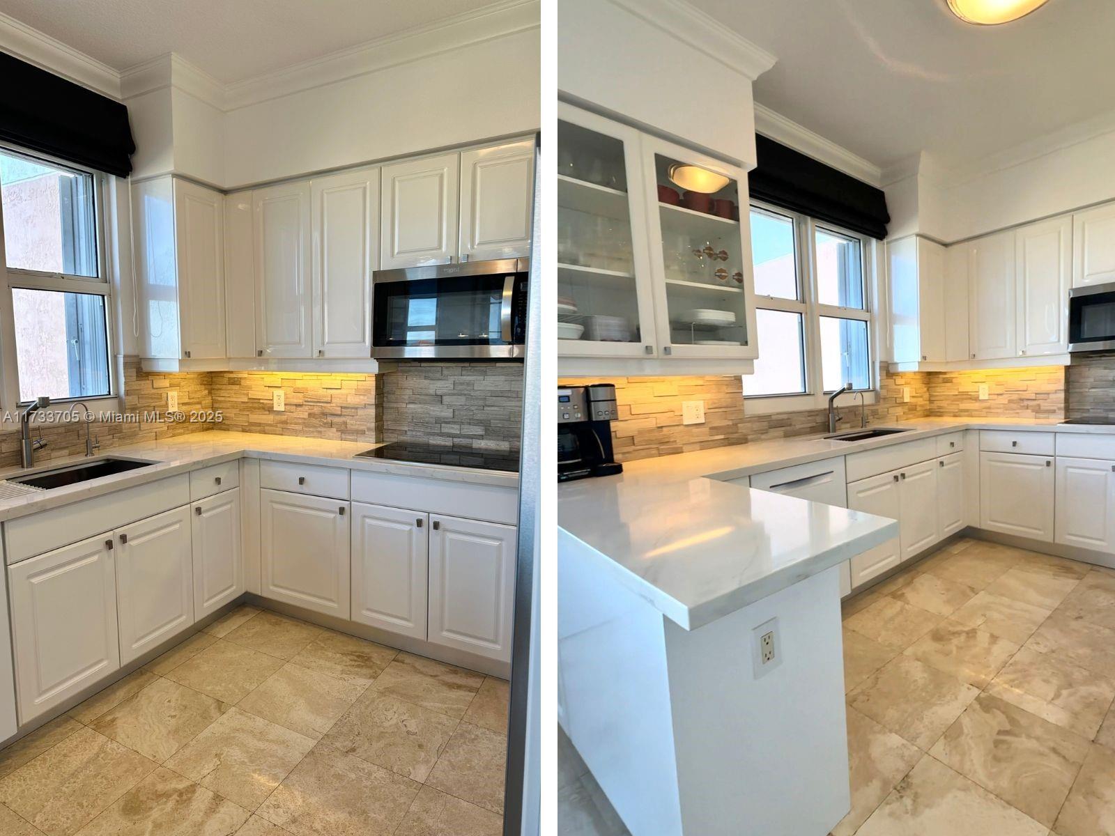 741 Crandon Boulevard, Unit PH4 Key Biscayne, FL 33149 - Photo 11 of 29 a kitchen with granite countertop a sink stove top oven and cabinets
