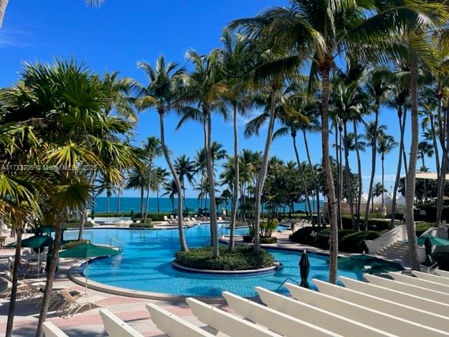 741 Crandon Boulevard, Unit PH4 Key Biscayne, FL 33149 - Photo 27 of 29 a view of a yard with palm trees