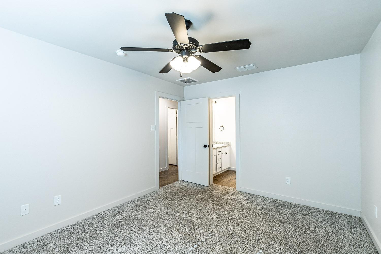 5517 121st Street, Unit B Lubbock, TX 79424 - Photo 23 of 37 a view of an empty room