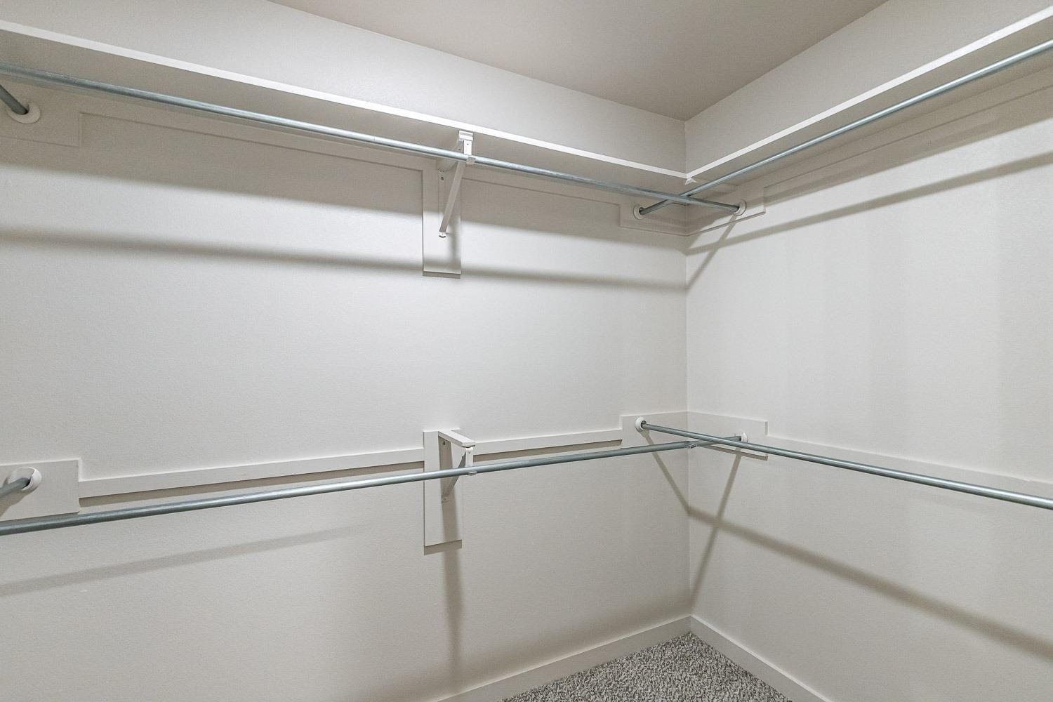 5517 121st Street, Unit B Lubbock, TX 79424 - Photo 29 of 37 a view of a room with racks on the wall