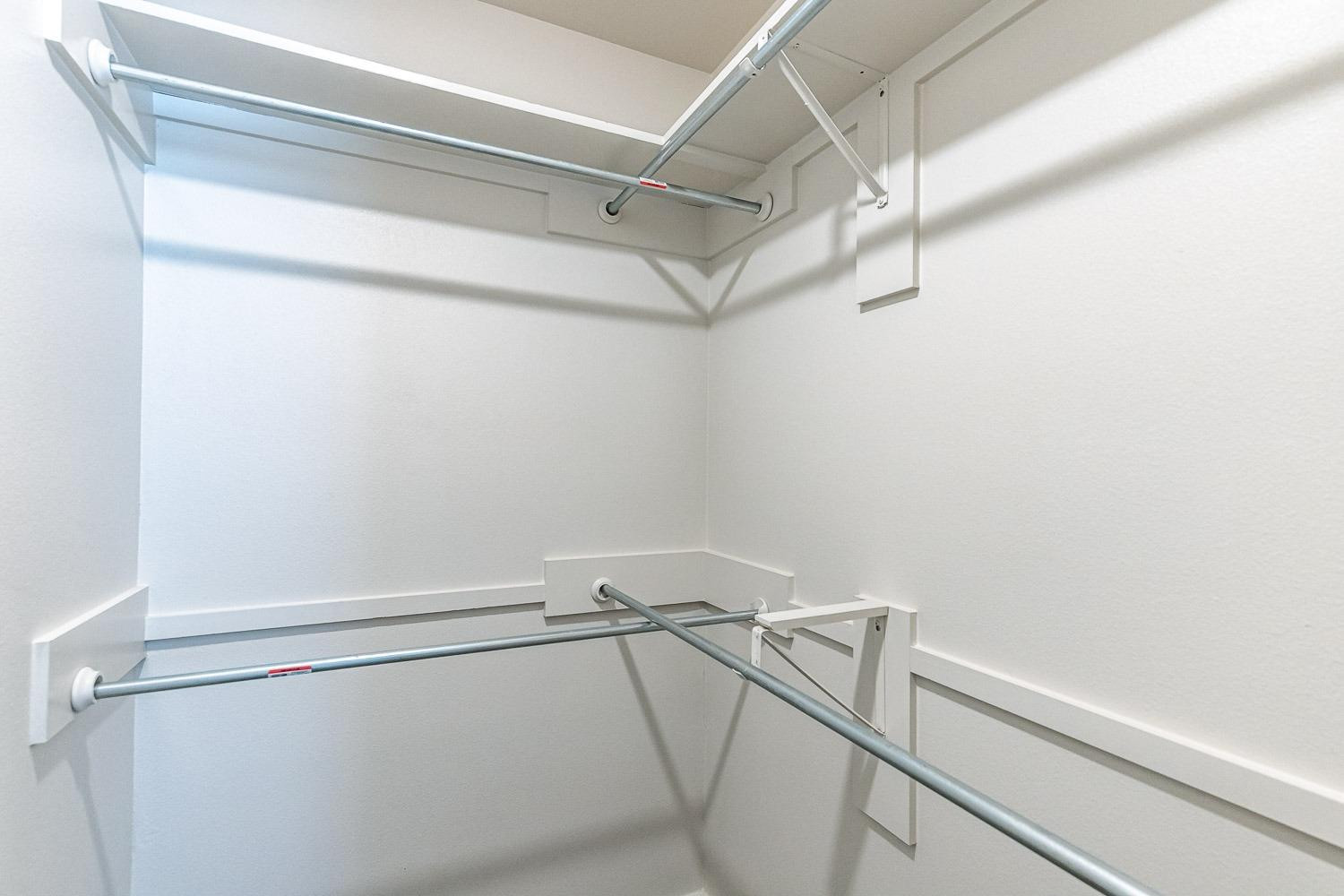 5517 121st Street, Unit B Lubbock, TX 79424 - Photo 32 of 37 a view of a room with racks on the wall