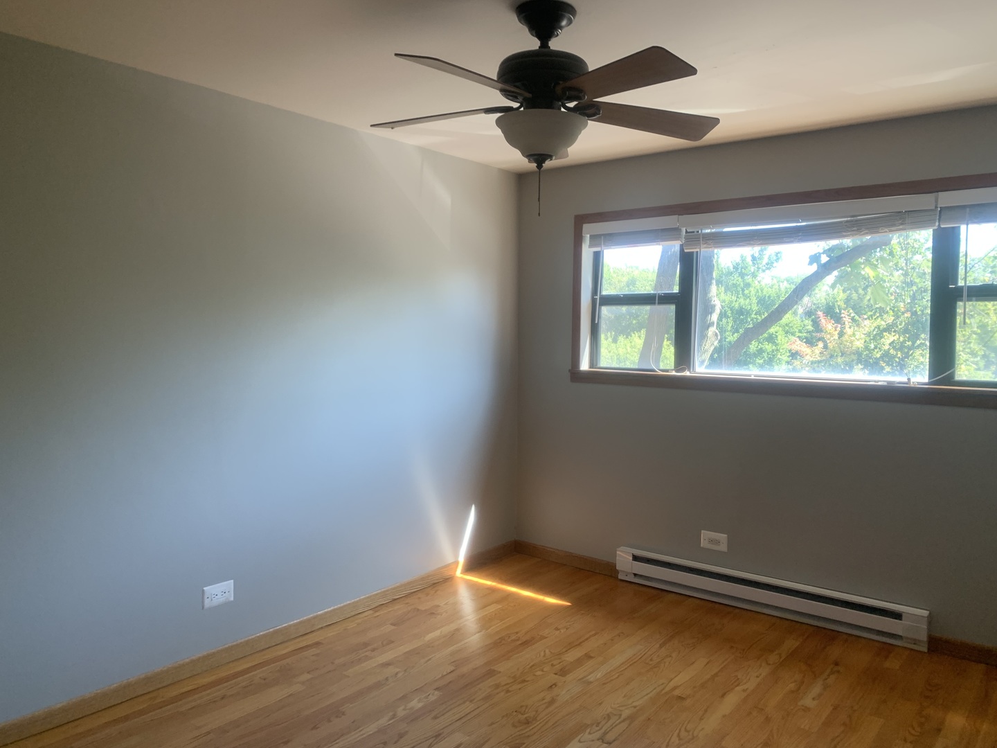 4424 Arbor Circle, Unit 3 Downers Grove, IL 60515 - Photo 11 of 12 an empty room with a window