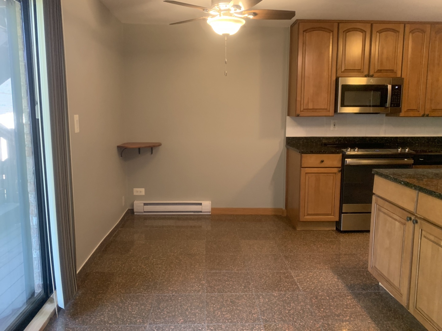 4424 Arbor Circle, Unit 3 Downers Grove, IL 60515 - Photo 4 of 12 a view of cabinets and wooden floor