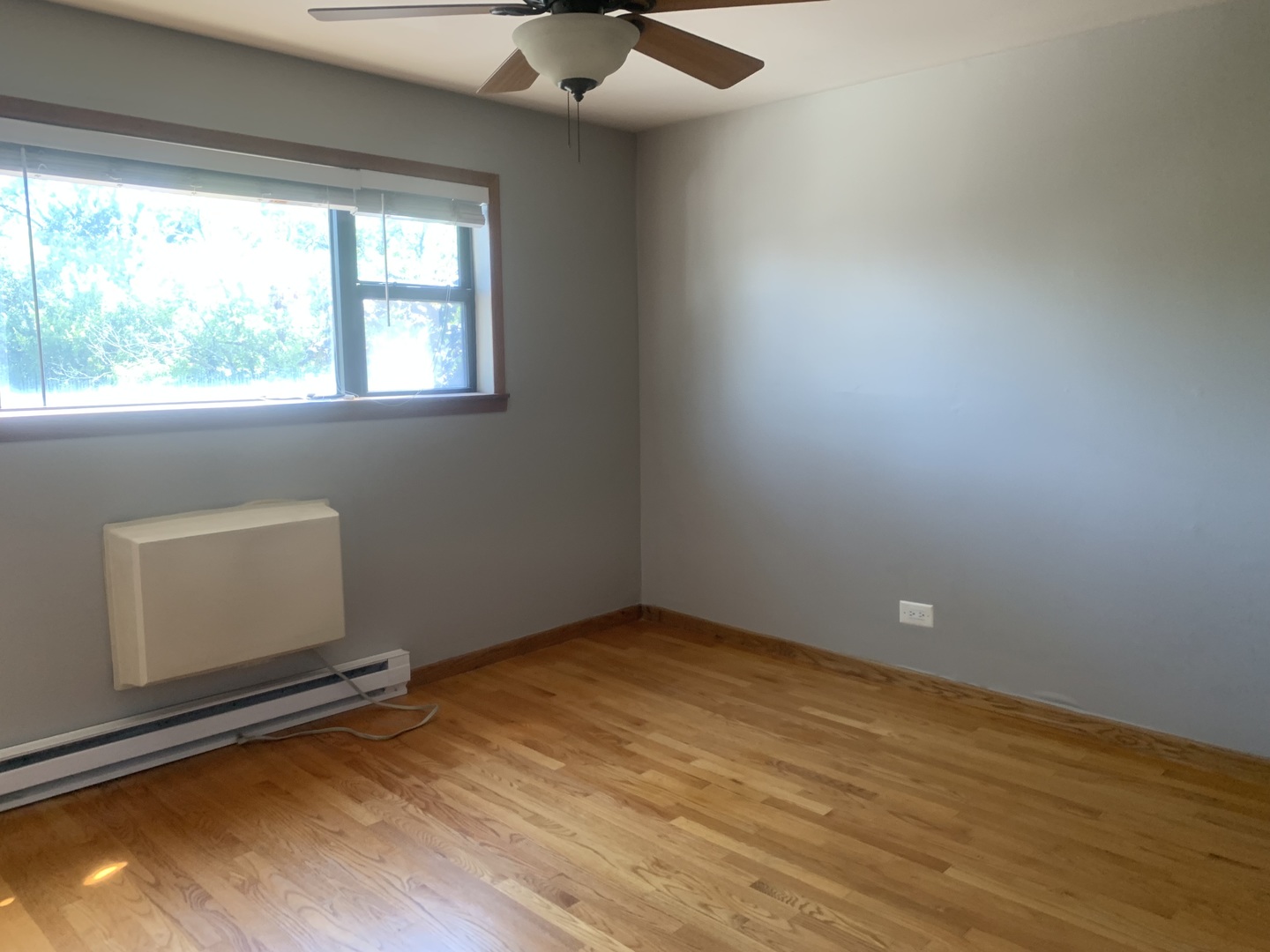 4424 Arbor Circle, Unit 3 Downers Grove, IL 60515 - Photo 9 of 12 an empty room with a window