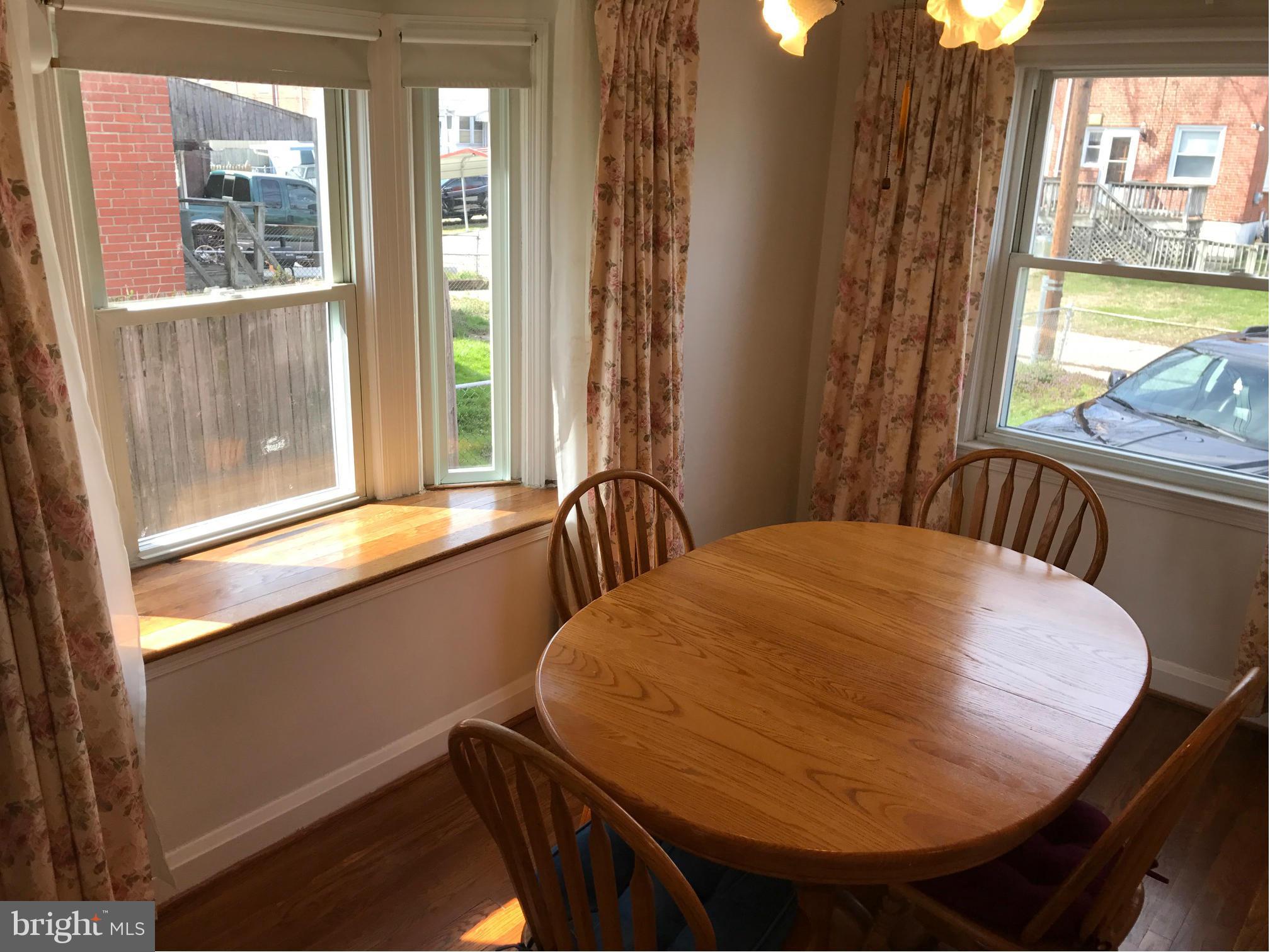 928 Arncliffe Road Baltimore, MD 21221 - Photo 9 of 27 Dining Room with nice bow window