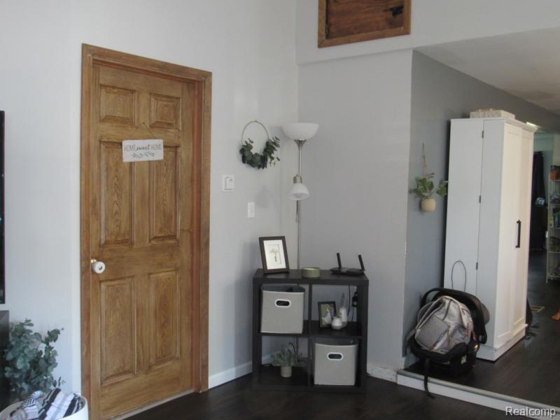 6020 Sheridan Road Vassar, MI 48768 - Photo 7 of 24 Corner of living room. Door leads to laundry/utili