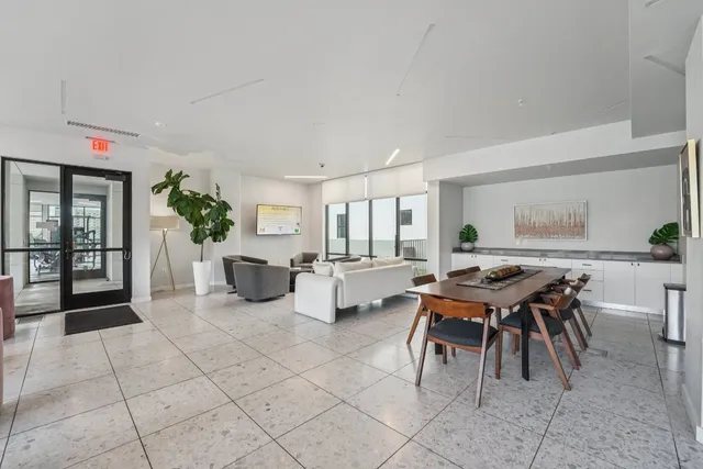 a outdoor space with lots of table and chair