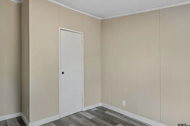 a view of small space with wooden floor