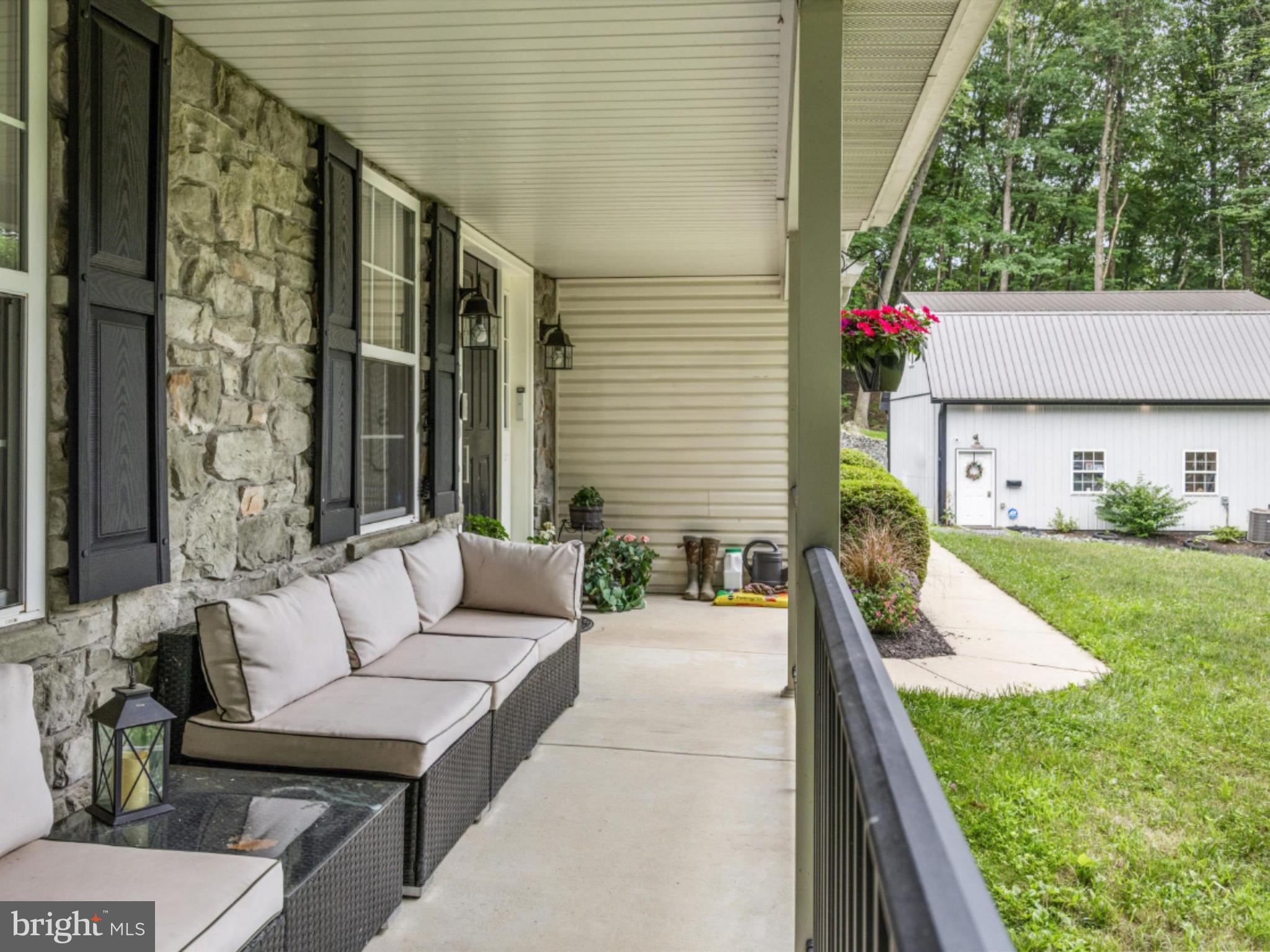 317 Blandon Road Fleetwood, PA 19522 - Photo 44 of 55 Covered front porch looking at pole barn