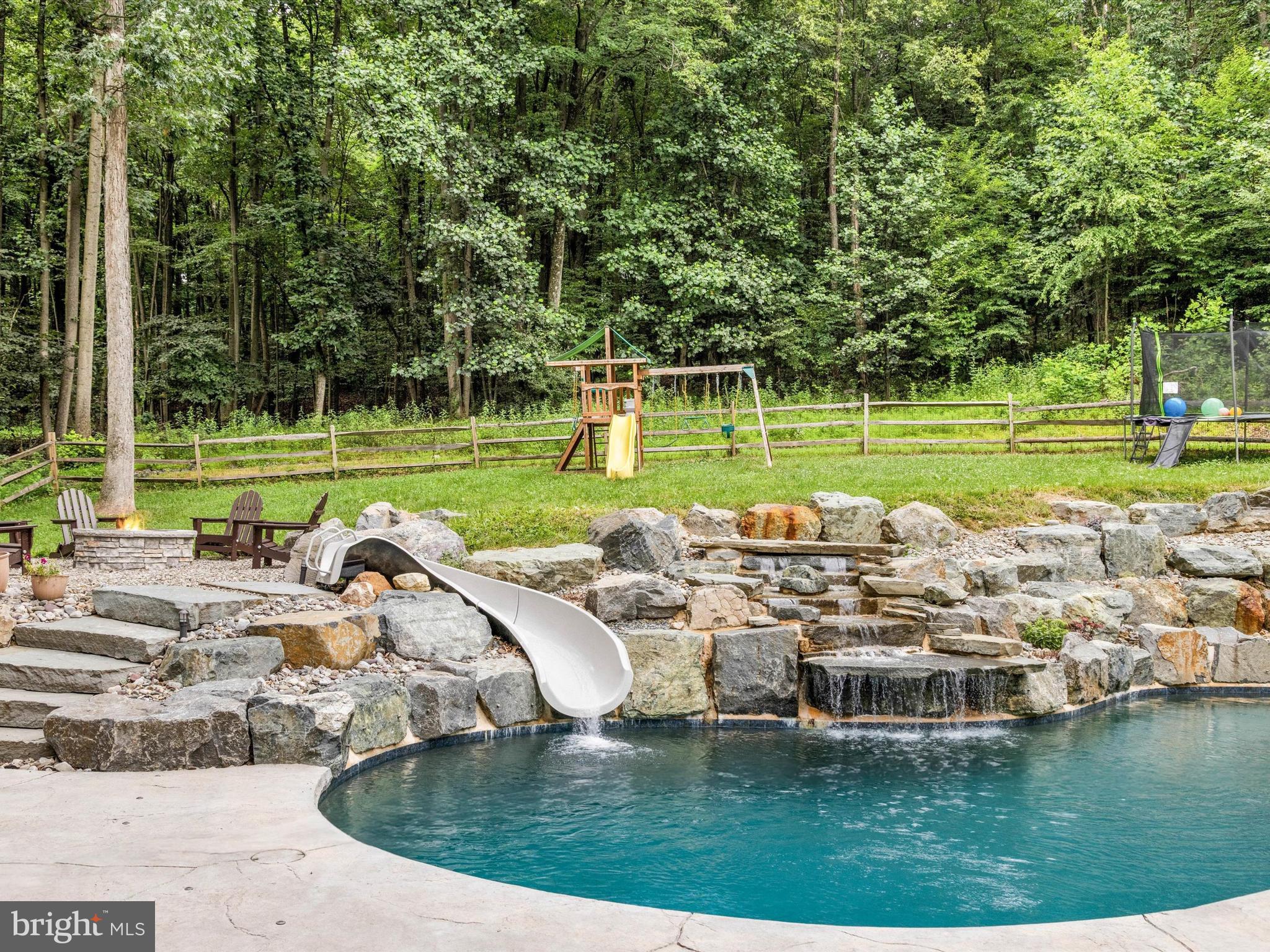 317 Blandon Road Fleetwood, PA 19522 - Photo 6 of 55 Saltwater Pool w/ sliding board & waterfall