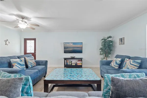a view of a living room and wooden floor