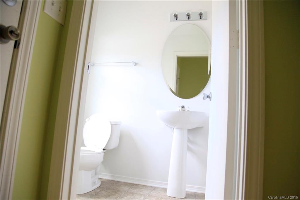 653 Potter Place Road, Unit 110 Fort Mill, SC 29708 - Photo 13 of 22 a bathroom with a sink and a toilet